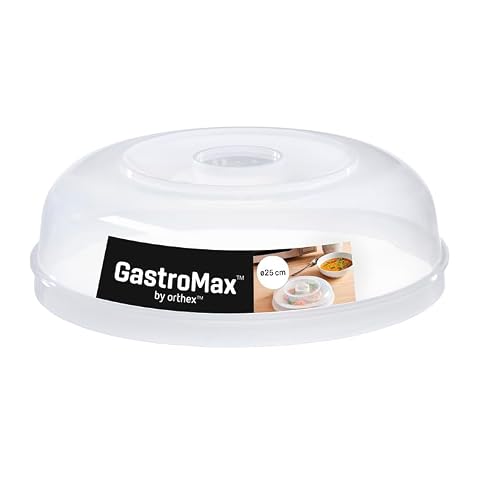 Cloche transparente pour micro-ondes de 25 cm avec poignée centrale et aérations, posée sur une assiette