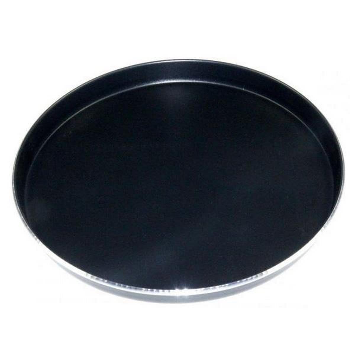 Plat Crisp Whirlpool rond à revêtement antiadhérent posé sur un plan de travail de cuisine claire