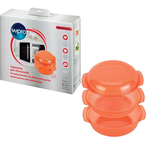 Cuiseur vapeur rond orange avec plat de base, couvercle et plaque filtrante sur un plan de travail