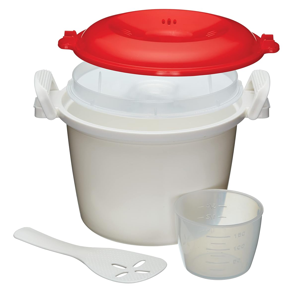 Cuiseur à riz KitchenCraft blanc et rouge avec sa spatule et son verre doseur sur un plan de travail