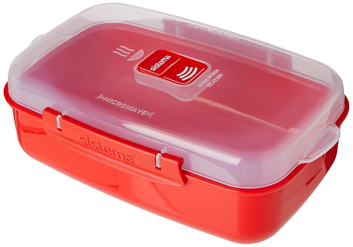 Boîte de cuisson micro-ondes rouge avec couvercle transparent et évent vapeur sur un plan de travail