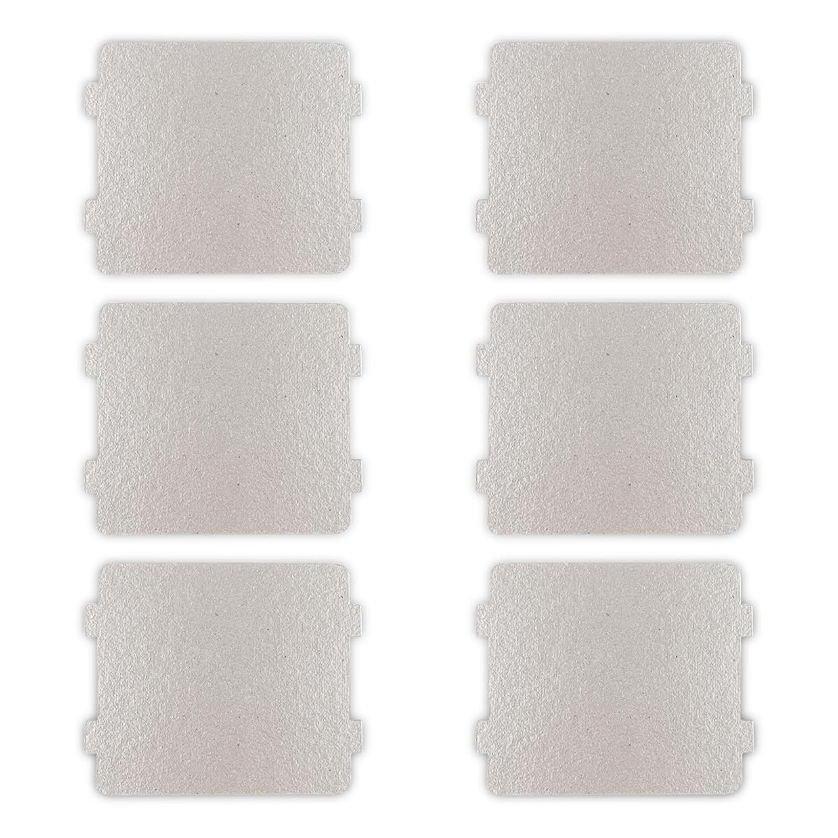 Six feuilles de mica Fousenuk pour micro-ondes, une à plat et cinq empilées sur un plan de travail.