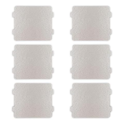 Six feuilles de mica Fousenuk pour micro-ondes, une à plat et cinq empilées sur un plan de travail.