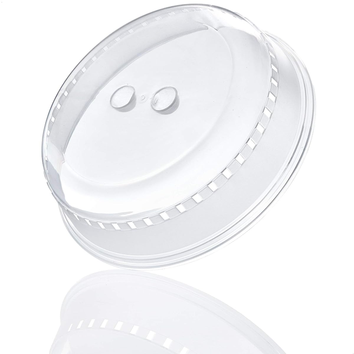 Cloche transparente de 23 cm posée sur une assiette dans une cuisine claire